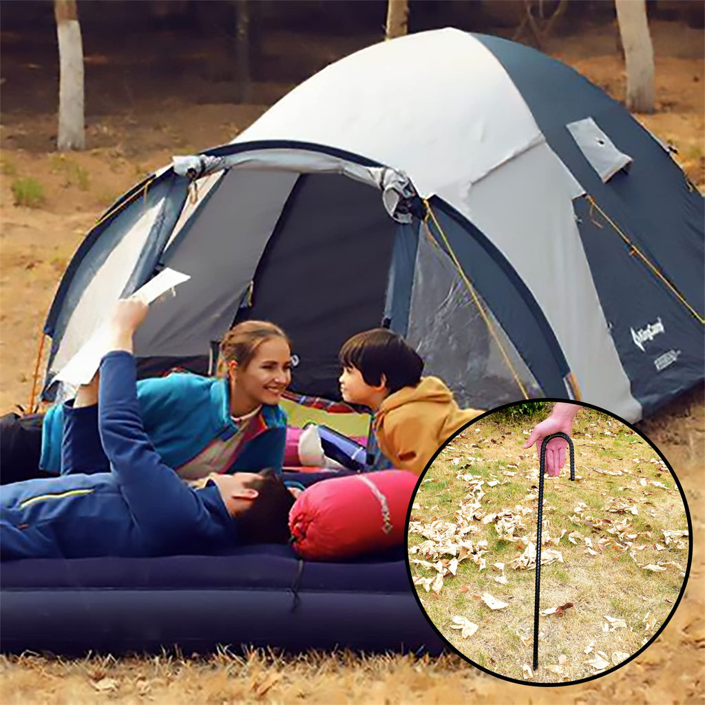 Securing camping tent with black J-hook rebar stakes in outdoor setting