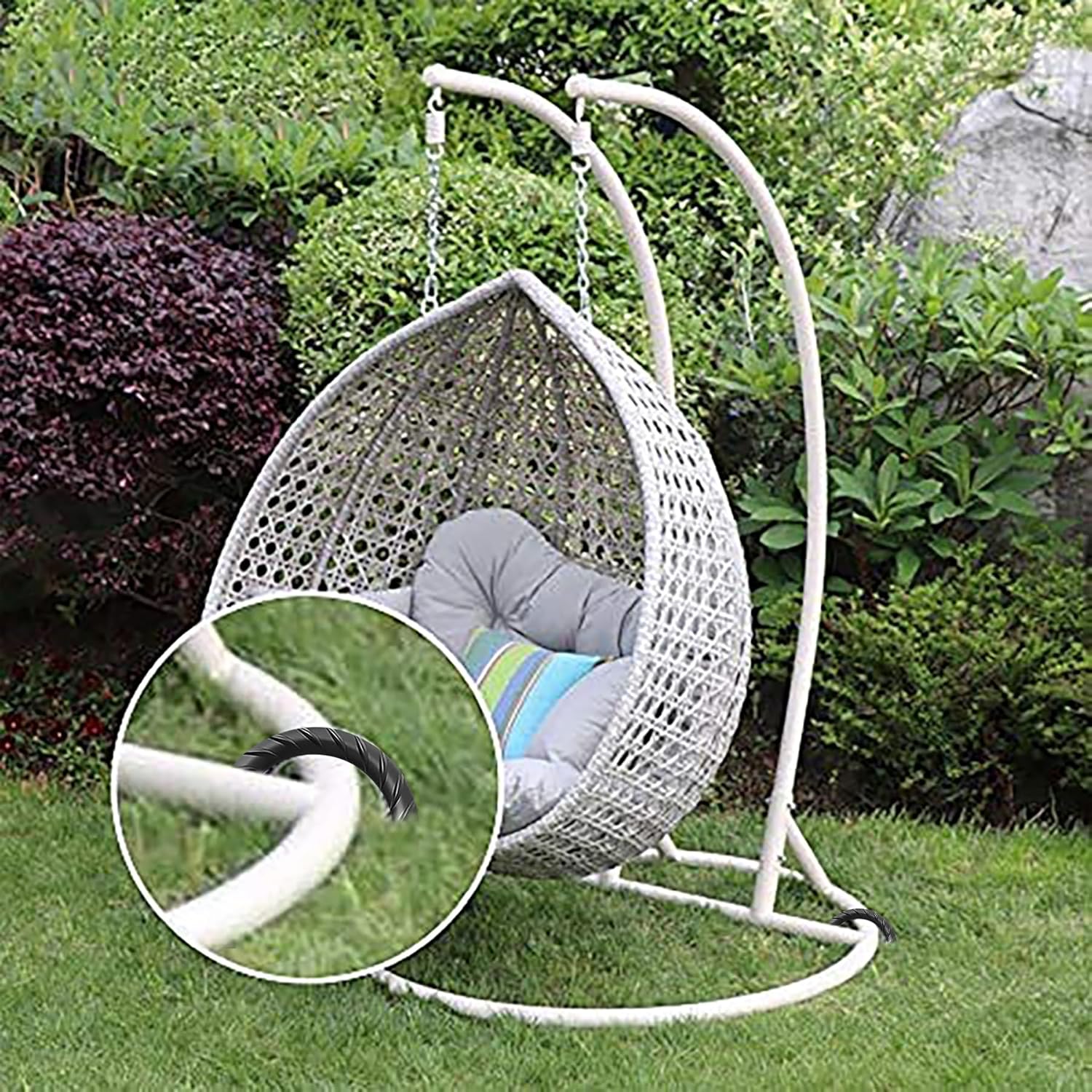 U-shaped rebar ground stakes in use: securing a wicker hanging chair to the lawn, ideal for outdoor patio and garden stability